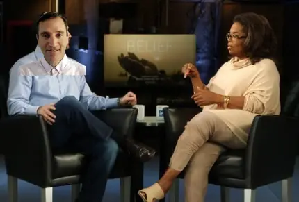 With Oprah beneath the 'Belief' plaque