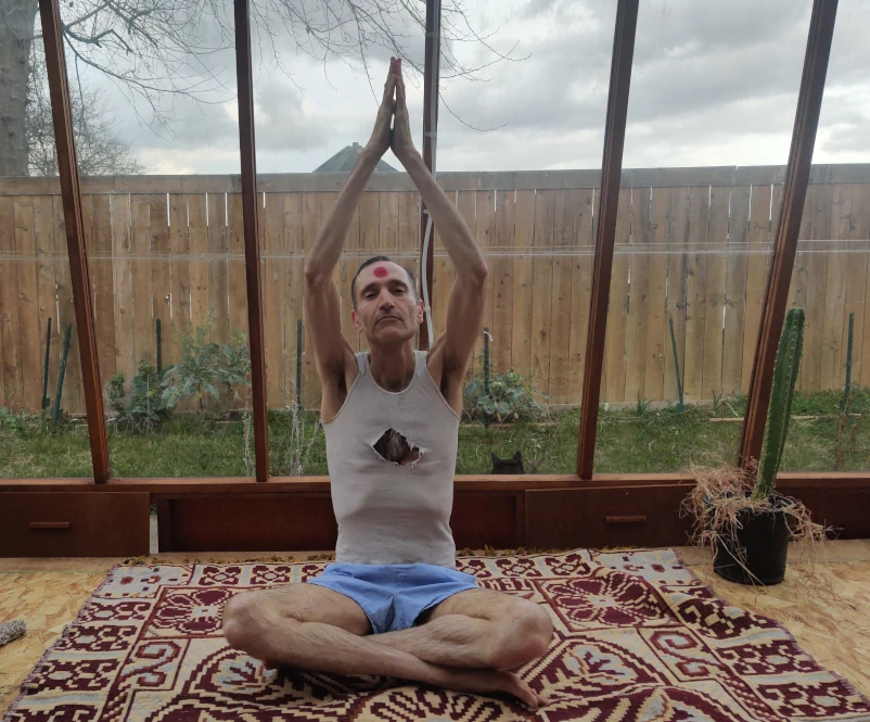 Joshua in Easy Pose with raised prayer hands